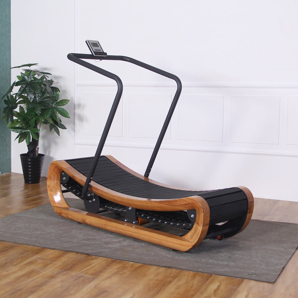 Tapis roulant en bois incurvé