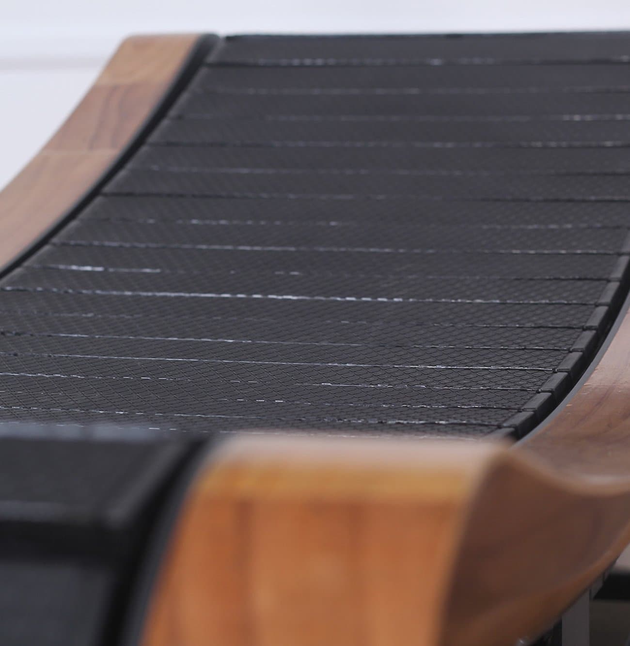 Tapis roulant en bois incurvé